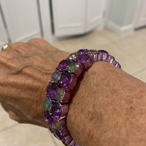 Eye catching comfort fit bracelet with beautiful purple and green stones